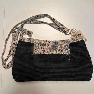 Green Jute crossbody purse.